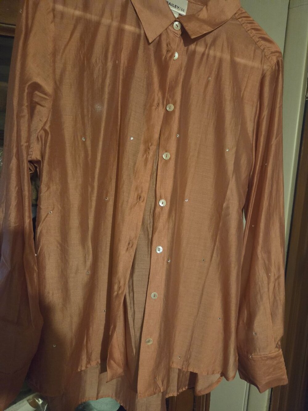 Sheer Copper color top with rhinestones.